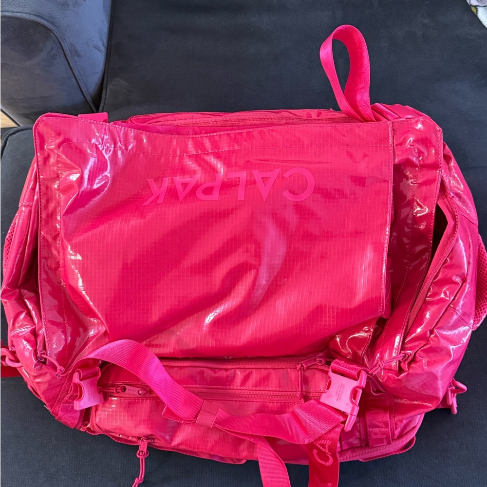 Calpak terra 50l laptop duffel bag in hot pink